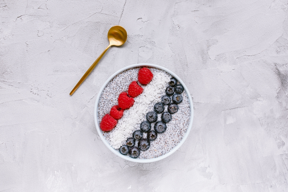 Overnight,Chia,Seed,Pudding,With,Fresh,Blueberries,Raspberries,And,Coconut